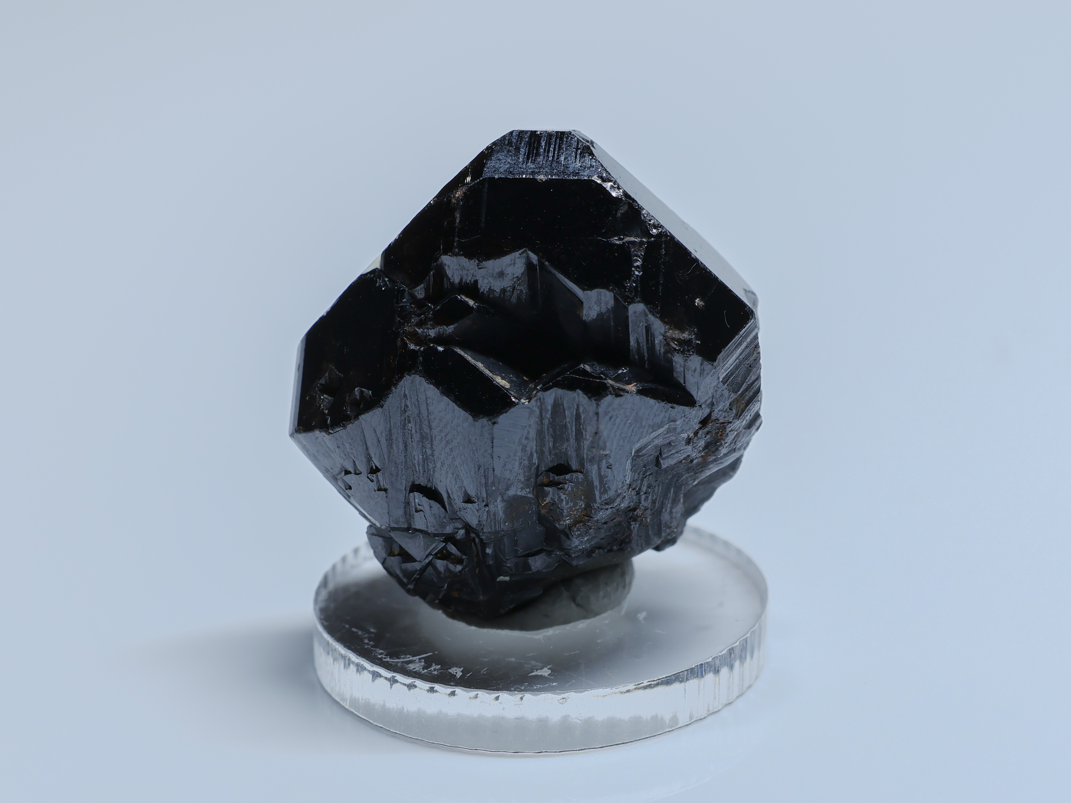 Shiny black-brown crystal of cassiterite from Bolivia - Viloco Mine (Araca Mine), Loayza Province, La Paz