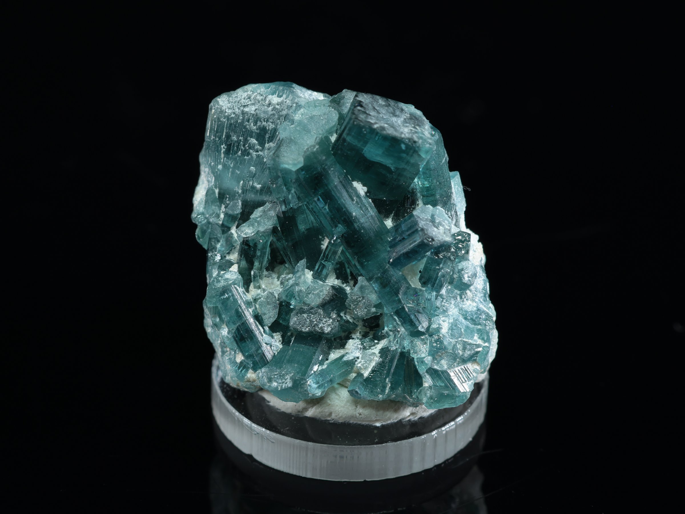 Blue-green cluster of tourmaline crystals from Afghanistan