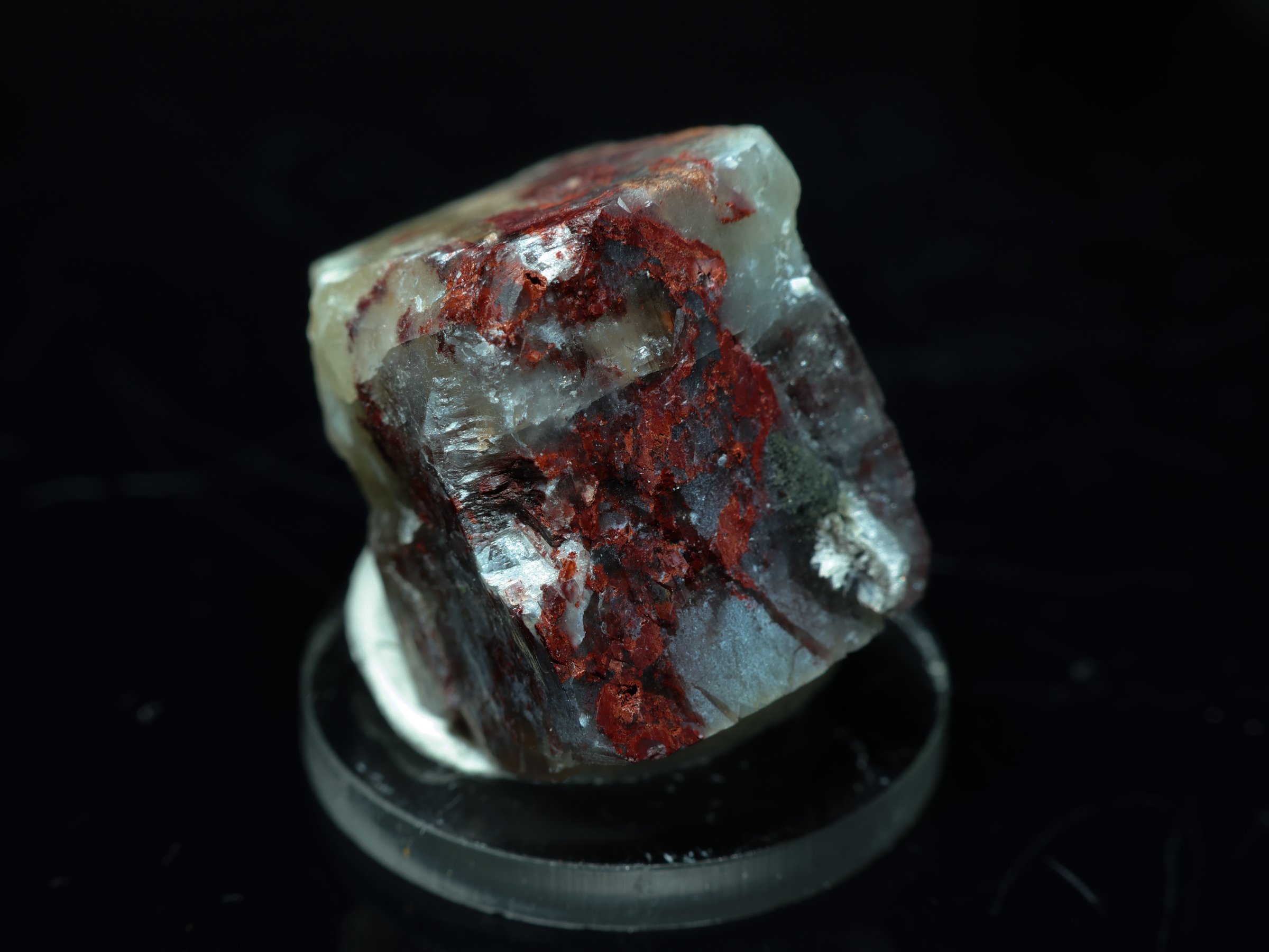 Apophyllite crystal with hematite inclusions from India
