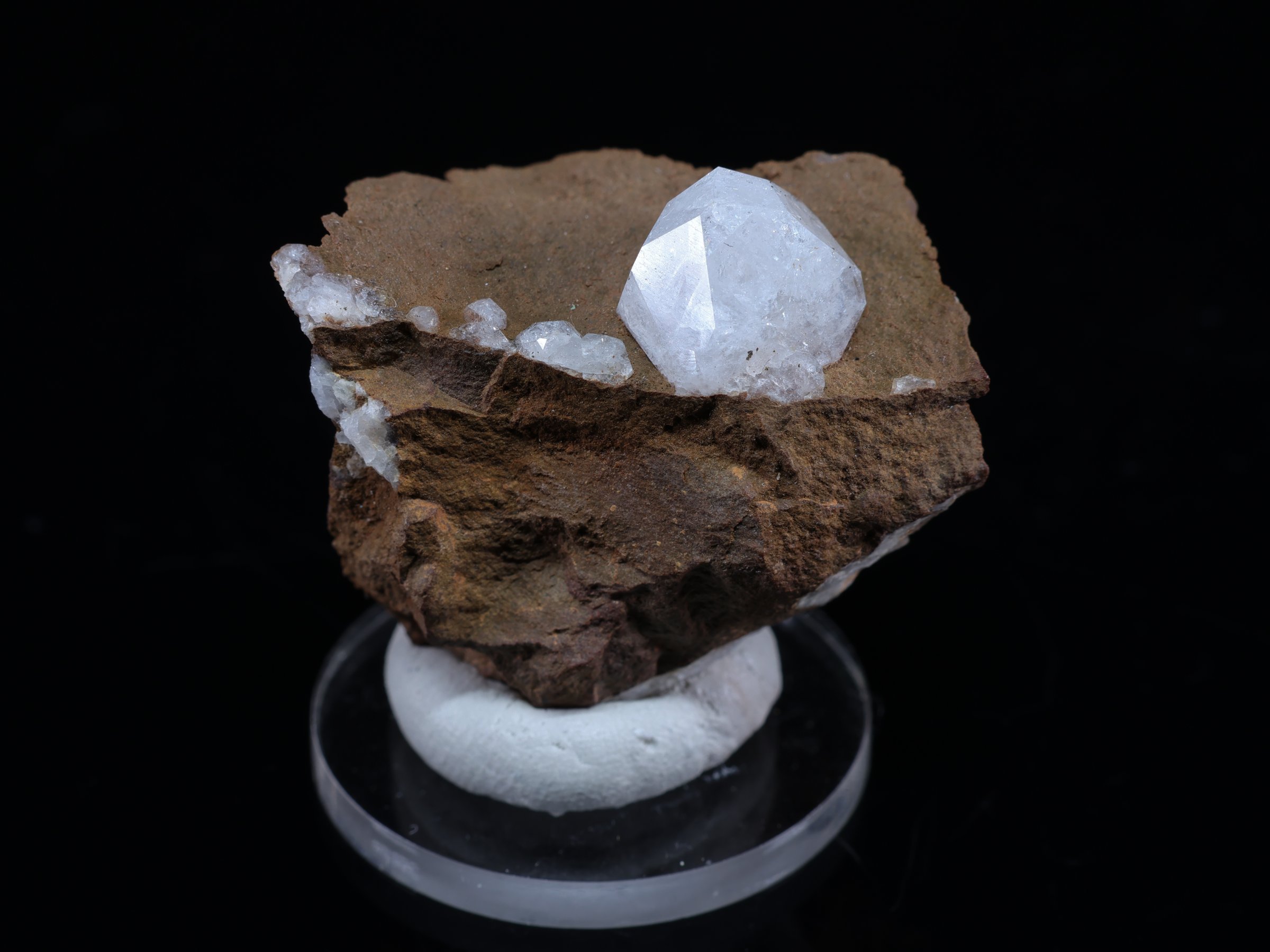 Milky white analcime crystal on matrix from Duingen, Germany